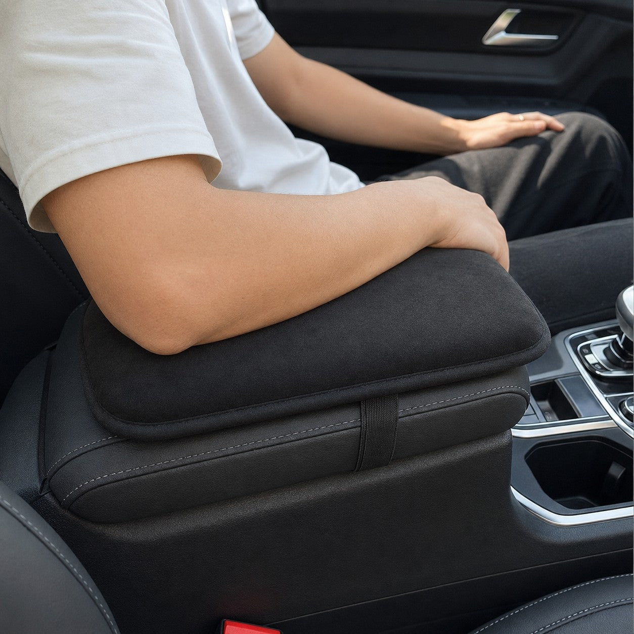 Driver leaning on the CushDrive armrest pad