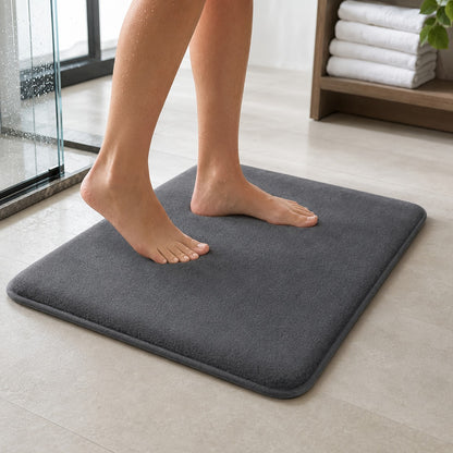 Stepping out of the shower onto the grey DrySoft bath mat