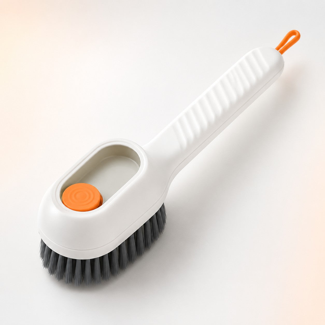 FoamGlide soap-dispensing cleaning shoe brush in white