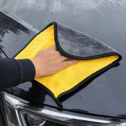 Wiping a car bonnet with the GleamPro microfiber cloth