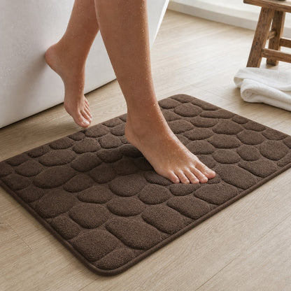 Standing on the coffee NoSlip bath mat by the shower