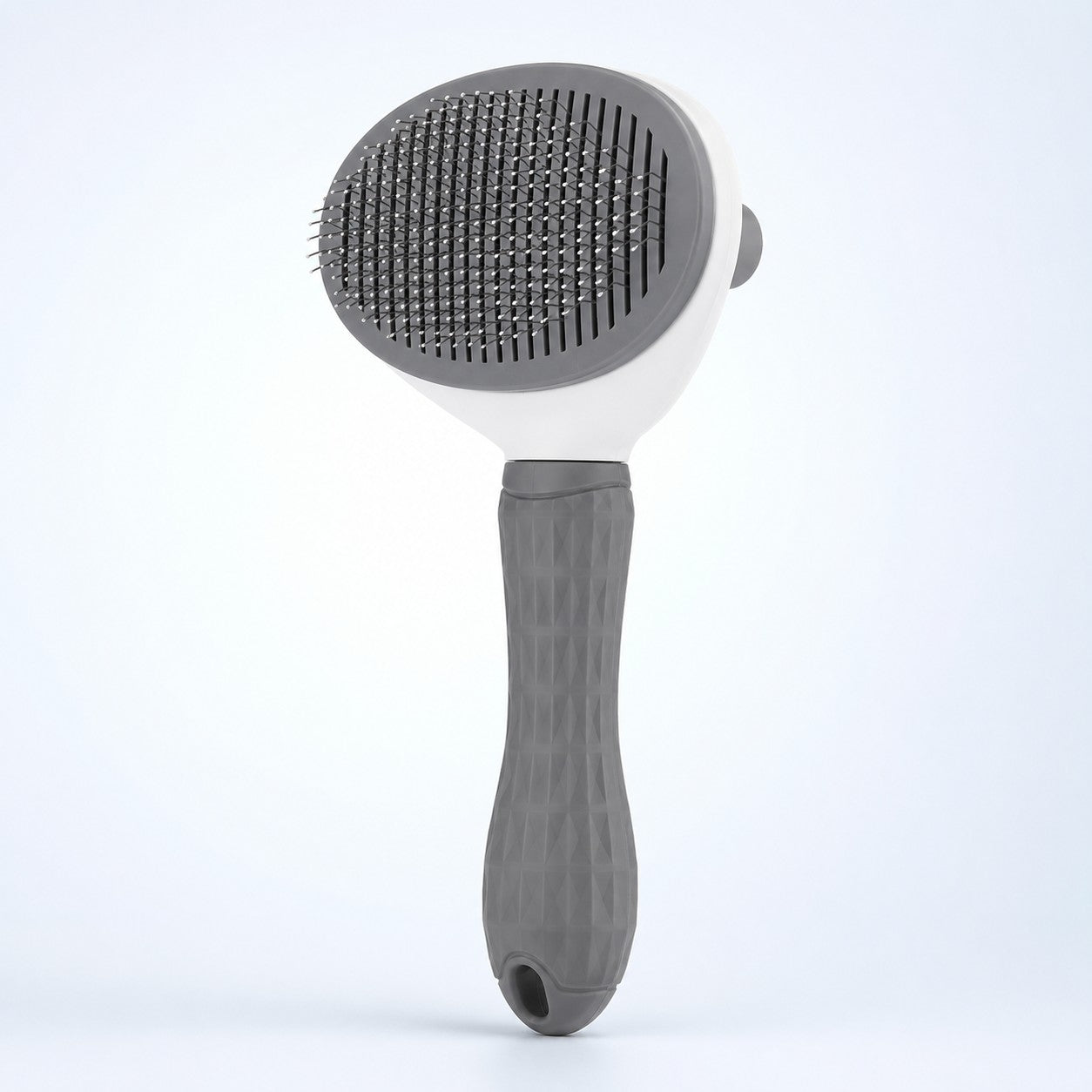 PurrGroom self-cleaning pet slicker brush in grey