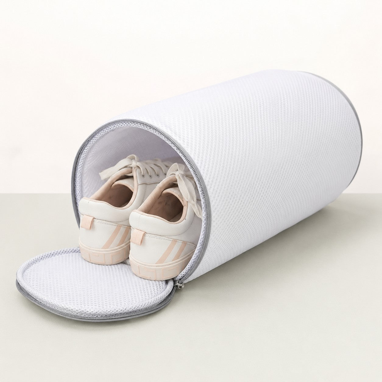 RollWash shoe washing bag open with sneakers inside