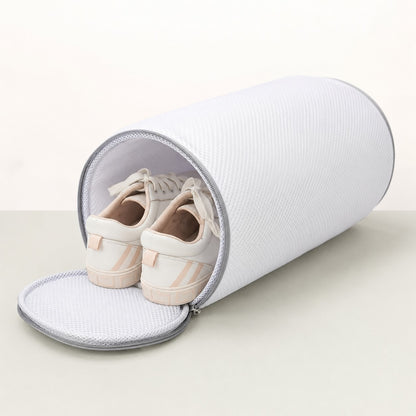 RollWash shoe washing bag open with sneakers inside