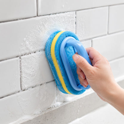Cleaning tiled walls with the ScrubEase sponge brush
