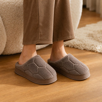 Close-up wearing the brown SnugHome house slippers at home