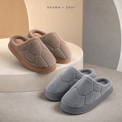 A his-and-hers pair of SnugHome house slippers
