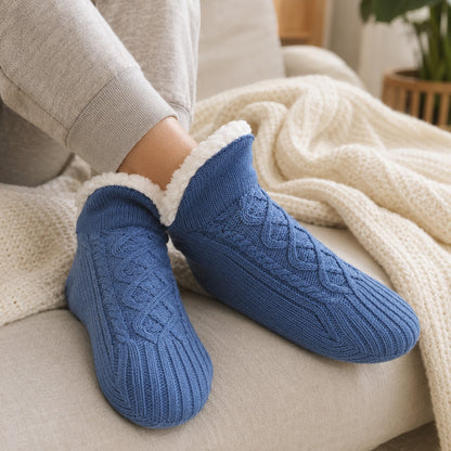 Close-up wearing the blue SnugSole thermal slipper socks