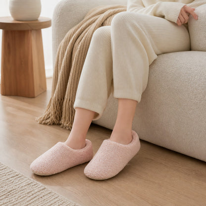 Close-up wearing the pink SnugStep cosy slippers